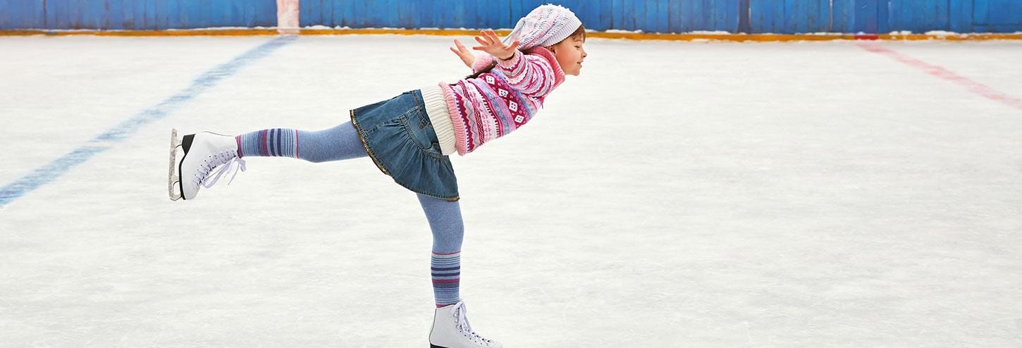 Ice skater on one leg.