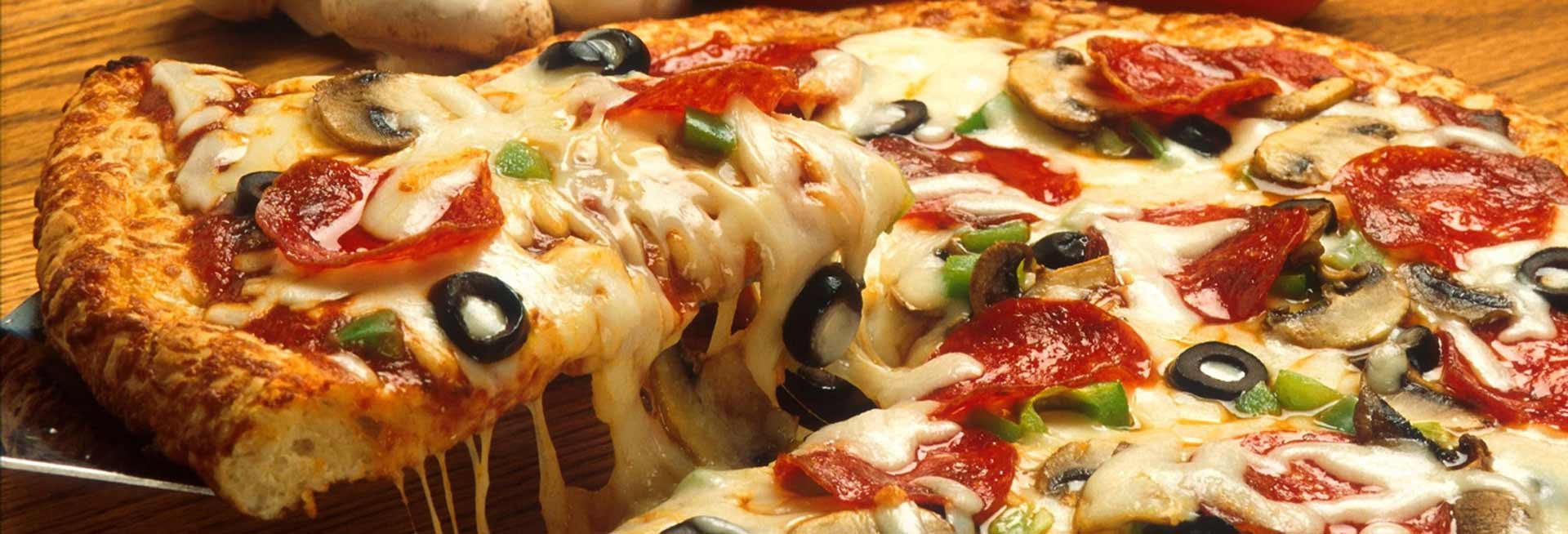Close up of supreme pizza.